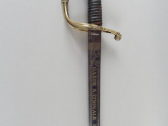 Vente aux enchères 237- Sabre modèle 1821 d’officier, lame à la Montmorency courbe à deux