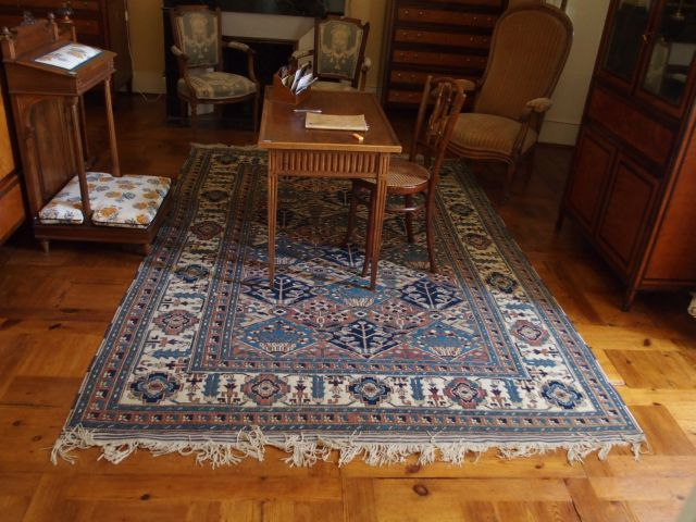 Tapis d'Orient en laine, fond beige et bleu
