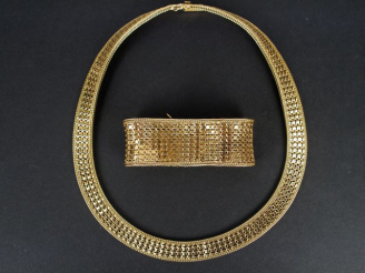 Vente aux enchères Parure 1900 en or jaune, maille plate semi-rigide, composée d'un colli