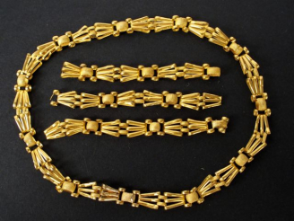 Vente aux enchères Collier et bracelet décor de draperies (morcelé) 1900 en or jaune. Poi