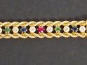 Vente aux enchères Bracelet or jaune et alternance de pierres à l'imitation du diamant, d