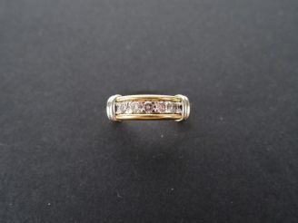 Vente aux enchères Alliance monture or jaune et or blanc, ornée de 5 brillants de 0,10cts
