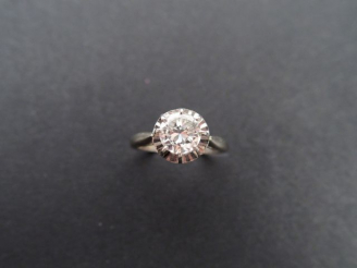 Vente aux enchères Solitaire monture or blanc orné d'un diamant demi-taille de 1cts envir