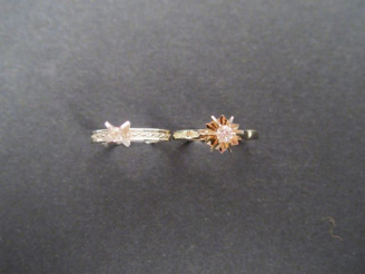 Vente aux enchères Solitaire monture or blanc ornée d'un brillant de 0,12cts environ. On 