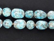 Bracelet double rang de perles irrégulières de turquoises.