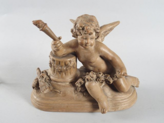 Vente aux enchères Sculpture en terre cuite patinée 'Amour'. H. : 28 cm