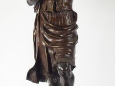 GUEYTON 'Le marchand d'armes turc'. Sculpture en bronze à patine brune
