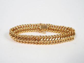 Vente aux enchères Bracelet gourmette en or jaune. 18cm environ Poids tel: 14,7gr