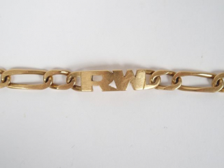 Vente aux enchères Gourmette en or monogrammée RW. 23cm environ Poids: 63,1gr