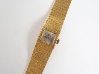 Vente aux enchères LA REINE BLANCHE. Montre de femme, boitier et bracelet maille italienn