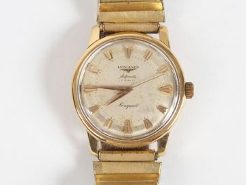 LONGINES, "Conquest". Montre automatique, boitier or.