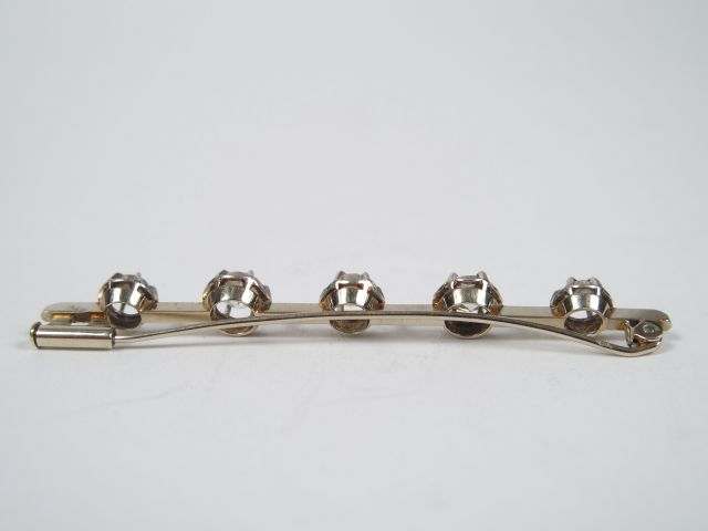 Broche monture or blanc ornée de 5 diamants taille ancienne de 0,30cts