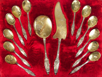 Vente aux enchères PUIFORCAT. Service à glace en argent et vermeil, poinçon Minerve, de s