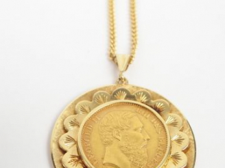 Vente aux enchères Pièce de 20 Francs or, Leopold II 1875, jolie monture en or jaune. On 
