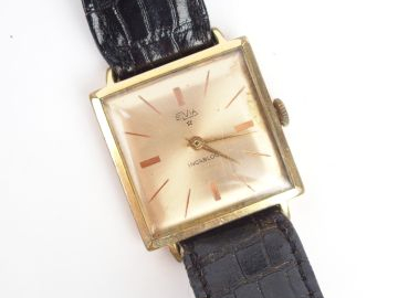 ELVIA. Montre d'homme, boitier carré.