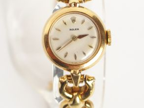 ROLEX. Montre bracelet de dame en or jaune, boitier rond. Poids tel: 2