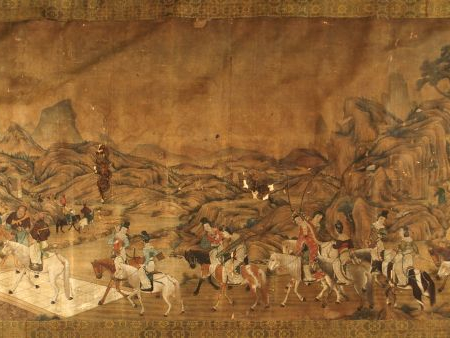 Grande toile peinte à décor polychrome d’une caravane de voyageurs à c