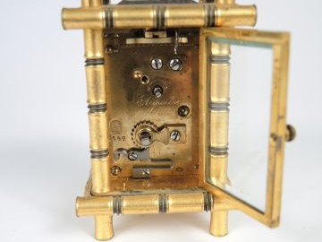 	Pendulette fin XIXème en cristal et bronze à l’imitation du bambou. H