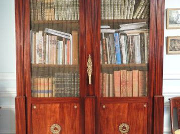 Bibliothèque XIXème de style Empire en acajou et placage d’acajou, ouv