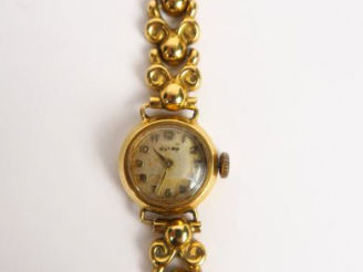 Vente aux enchères Montre de marque Ultra, bracelet et cadran en or. Poids : 24.5 g tel A