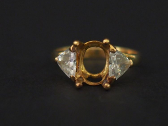 Vente aux enchères Bague en or et deux diamants.  Poids tel : 3,10 g   