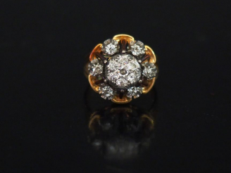 Vente aux enchères Bague 1900 marguerite en or jaune et diamants, belle monture ajourée. 