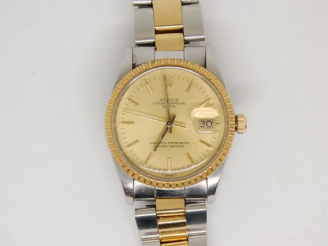 Vente aux enchères ROLEX. Montre d'homme, avec son bracelet en métal articulé