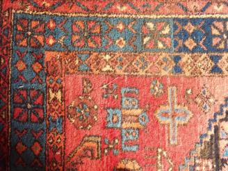 Vente aux enchères Tapis d'Orient fond rouge