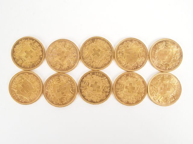 10 pièces de 20 Francs Suisse or.  Poids: 64,6gr