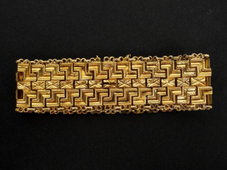 Vente aux enchères Bracelet large en or jaune. Fermoir à cliquet. Poids: 15,5gr
