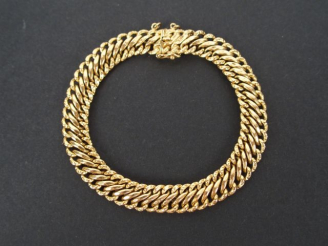 Vente aux enchères Bracelet maille américaine en or jaune.  38cm environ Poids: 11,5gr