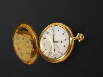 Vente aux enchères LONGINES. Montre savonnette en or jaune, mécanisme et boitiers signés 