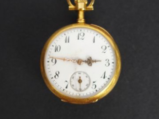 Vente aux enchères Maison Ancely à Toulouse. Montre de col en or jaune, décor de monogram