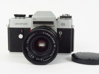 Vente aux enchères Leitz : Leicaflex SL N° 125203  objectif Summicron R 2/35  N°2936242 s