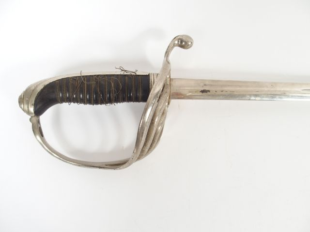 Sabre Français d’officier réglementaire modèle 1882, fusée corne  fili