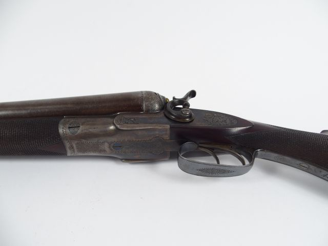 Beau fusil de chasse juxtaposé à chien de fabrication Anglaise calibre