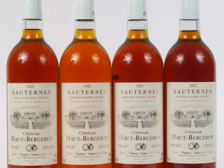 Vente aux enchères 4 BOUTEILLES CHÂTEAU HAUT BERGERON SAUTERNES - 2002