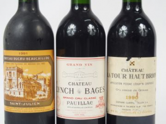 Vente aux enchères 3 BOUTEILLES : 1 BOUTEILLE CHATEAU LA TOUR HAUT BRION CC GRAVES 1990 E