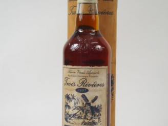 Vente aux enchères 1 BOUTEILLE RHUM TROIS RIVIERES 42° - 1997