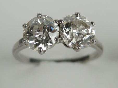 Bague Toi   Moi, monture en  platine, ornée de deux diamants taille an