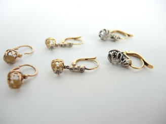 Vente aux enchères Paire de perce-oreilles en or jaune ornés de diamant taille ancienne d