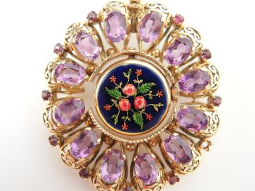 Broche pendentif monture en or ajouré, petite montre émaillée au centr