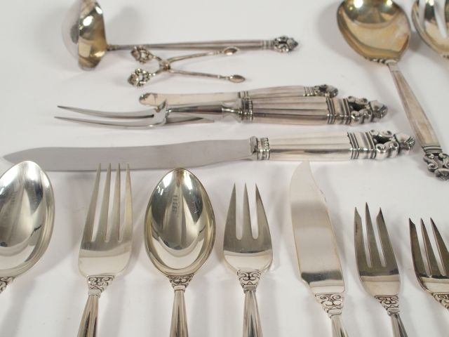 	Georg JANSEN. Ménagère en argent, modèle Acorn comprenant : - 9 grand