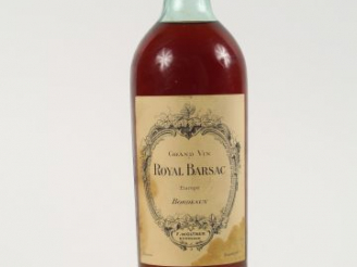 Vente aux enchères 1 BOUTEILLE ROYAL BARSAC F. WOLTNER ANNEES 20/30 - LB-HEP/ELT/CAPS AB