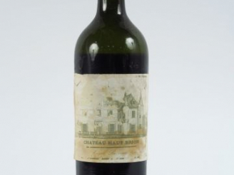 Vente aux enchères 1 BOUTEILLE CHÂTEAU HAUT BRION 1er GCC GRAVES - ANNEES 10/20 - VIDANGE
