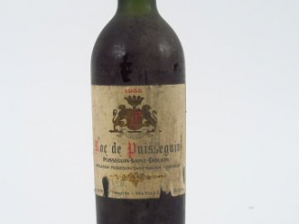 Vente aux enchères 1 BOUTEILLE CHÂTEAU ROC DE PUYSSEGUIN ST EMILION - 1955 - LB/EA