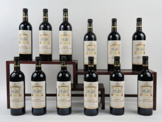 Vente aux enchères 12 BOUTEILLES CHÂTEAU LA TOUR CARNET HAUT MEDOC - 1998 - CBO - ELF