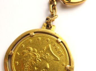 Pièce de 10 Dollars 1894  monté en porte-clé. L'Ensemble en or. Poids 
