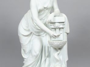 LECORNEY  « Jeune femme à la fontaine ». Sculpture en biscuit. Signée.