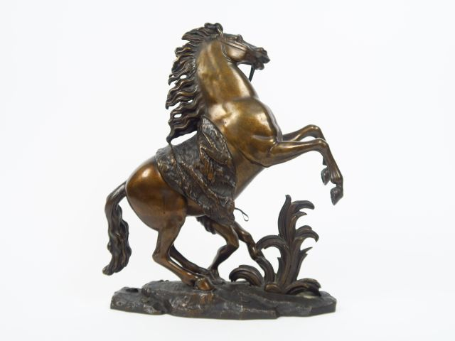 COUSTOU (d'après) 'Cheval de Marly'. Sculpture en bronze à patine méda
